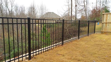 metal flashing requirement between fences and houses|fitting fence posts near house.